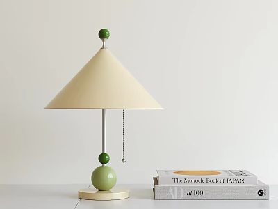 Minimalist Table Lamp With Beige Cone Shade And Green Decorative Balls Beside Stacked Books 3d model