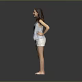 Woman in Striped Tank Top and Shorts Standing with Hands on Hips Against Gray Background