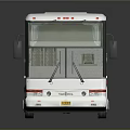 White Modern Coach Bus With Large Windows And Shiny Exterior Design