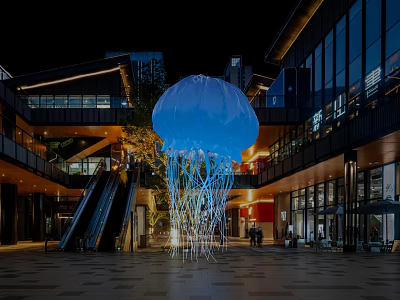 Large Blue Inflatable Jellyfish With Illuminated Tentacles In Nighttime Commercial Plaza 3d model