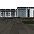 Evening View Of Modern School Building Exterior Illuminated With Trees Lawns And Pedestrians