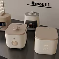 Beige And White Kitchen Appliances On Dark Countertop With Minotli Logo