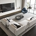 Modern White Sofa and Round Coffee Table Set with Throw Pillows in Spacious Living Area