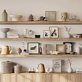 Curated Decorative Ornament Set on Wooden Shelves with Vases Frames Decorative Books and Sculptures