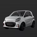 White Compact Two Door City Car With Modern Front Grille And Black Wheels