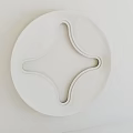 Modern White Circular Ceiling Design With Intricate Cross Pattern And Smooth Surface