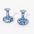 Pair of Blue and White Ceramic Candle Holders with Floral Vine Patterns