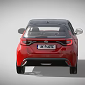 Red Toyota Hatchback With Black Roof UK License Plate And Alloy Wheels