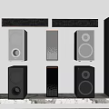 Different Style Speaker Systems Arranged On Shelf With Modern Design Features