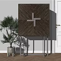 Modern Decorative Cabinet With Wooden Chevron Pattern Cross Detail And Indoor Plant By White Wall