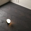 Dark Herringbone Wooden Flooring with Natural Grain and Floor Lamp in Modern Interior