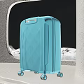 Blue Striped Travel Suitcase With Modern Design Wheels And Snowy Landscape