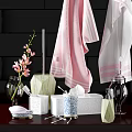 Elegant Bathroom Accessories With Pink White Towels Flowers And Tissue Box