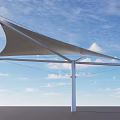 Outdoor Tensile Membrane Canopy with White Fabric and Metal Frame Under Blue Sky