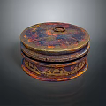 Intricately Carved Multi Layered Circular Sculpture Box With Colorful Surface Patterns