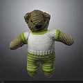 Knitted Teddy Bear Stuffed Animal Wearing White Sweater And Green Striped Pants