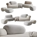 Modern Sectional Sofa with Curved Design Soft Fabric and Matching Ottoman in Living Room Interior