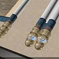 Traditional White Shafts With Golden Decorated Ends And Blue Glowing Accents On Fabric With Scroll