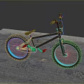 Black BMX Bike With Blue Glowing Rims On Concrete Surface For Stunt Riding
