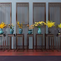 Modern Interior Adorned With Blue Vases Holding Yellow Flowers On Wooden Stands And Carved Screens