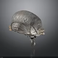 Abstract Metallic Sculpture With Smooth Curved Surface And Reflective Finish
