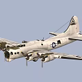 Military Fighter Jet With Propeller Engines And US Air Force Insignia In Blue Sky