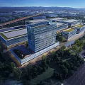 Modern Industrial Factory Complex With Multiple Buildings Green Roofs And Trees
