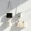 Stylish Black And White Handbags With Crossbody Straps And Structured Designs