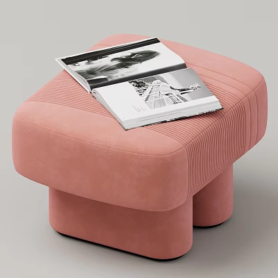 Pink Textured Upholstered Stool With Curved Legs And Open Magazine Placed On Top 3d model