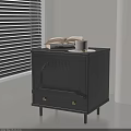 Black Bedside Table with Gold Knobs Drawer Topped with Open Book White Cup on Tray 3d model