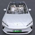 Light Gray Electric Car With Transparent Roof And Green License Plate