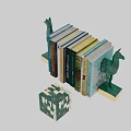 Colorful Books Neatly Arranged With Green Camel Bookends On Shelf