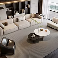 Modern Sofa And Coffee Table Set In Living Room With Beige Upholstery Ottoman And Bookshelves