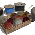 Assorted Colorful Yarn Balls And Thread Spools Collection In Woven Basket