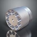 Silver Cylindrical Metal Part With Threaded Surface And Circular Holes On Reflective Base