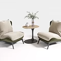 Modern Leisure Chairs With Beige Cushions Dark Frame And Small Round Table With Green Plant