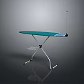 Green Ironing Board With Metal Frame And Electric Iron On Top