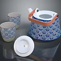 Elegant Blue And White Geometric Pattern Teapot With Orange Handle And Two Cups