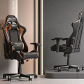 Modern Black And Orange Gaming Chair With Ergonomic Design And Display Setup