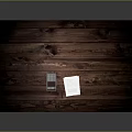 Wooden Desk With Smooth Desktop And Small Items On Top Surface