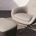 Modern Gray Upholstered Armchair and Ottoman Set with Curved Design and Metal Base
