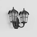 Classic Black Wall Lamps With Decorative Glass Shades Illuminated On Stone Wall