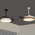 Two Modern Ceiling Lights With Fan Blades Black And White Bases Illuminating Room Corner