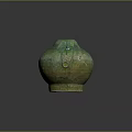 Handcrafted Green Ceramic Jar With Glazed Surface And Traditional Design