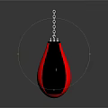 Red And Black Punching Bag Design With Hanging Chain On Dark Background