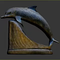 Detailed Leaping Dolphin Sculpture With Wave Textured Base And Metallic Finish