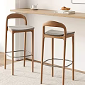 Stylish Bar Stools With Wooden Frame And Gray Cushions In Modern Interior