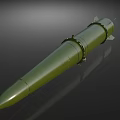 Green Military Missile With Conical Warhead Cylindrical Body And Rear Fins On Dark Background