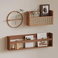 Wooden Wall Decor with Circular Accent Shelves Magazines Golden Kettle and Green Plant