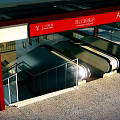 Zhujiang New Town Modern Subway Station with Escalators Glass Railings and Entrance Roof Structure